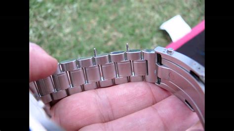 taking links of omega seamaster 300 watch band|omega bracelet youtube.